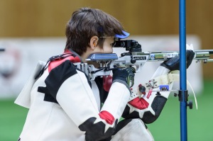GABALA - AUGUST 13: Gold medalist Dongqi CHEN of the Peoples Republic of China competes in the 50m Rifle 3 Positions Women Finals at the Gabala Shooting Club during Day 6 of the ISSF World Cup Rifle/Pistol/Shotgun on August 13, 2015 in Gabala, Azerbaijan. (Photo by Nicolo Zangirolami)